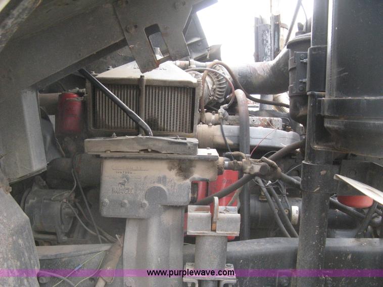 image for item H5424 1984 Mack MR686S roll-off truck