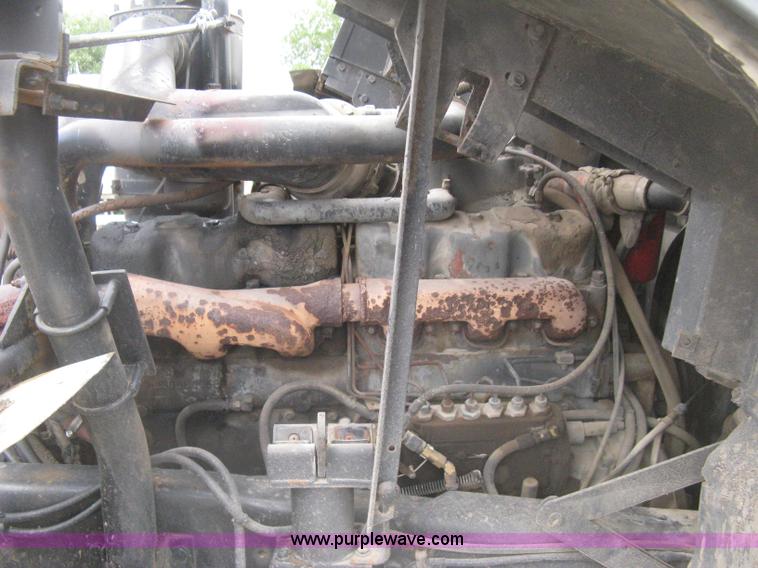 image for item H5424 1984 Mack MR686S roll-off truck