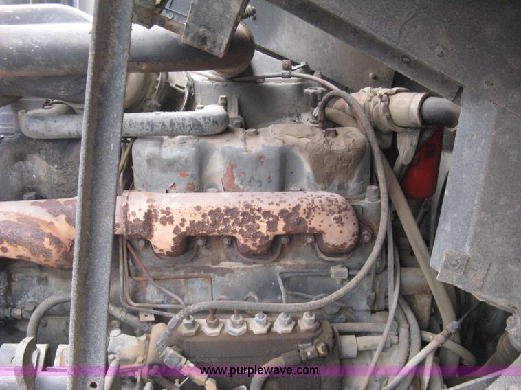 image for item H5424 1984 Mack MR686S roll-off truck