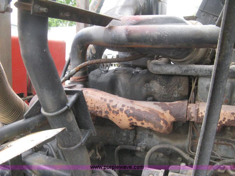 image for item H5424 1984 Mack MR686S roll-off truck