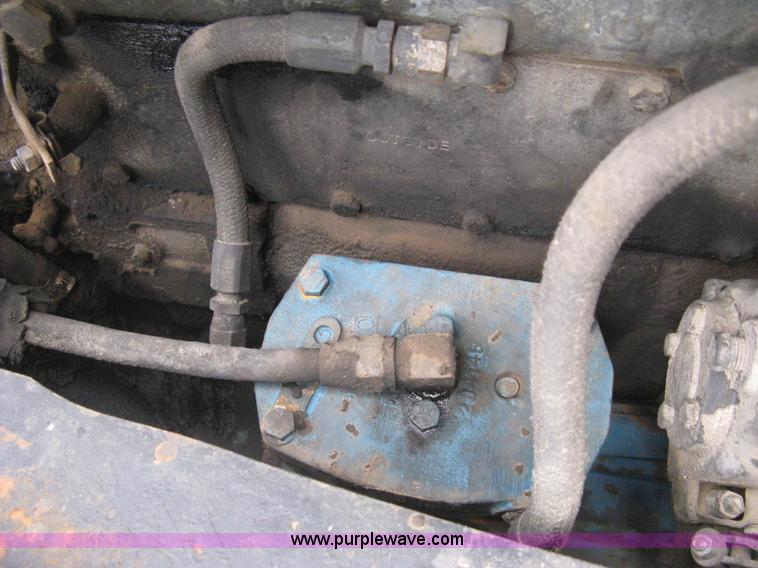 image for item H5424 1984 Mack MR686S roll-off truck