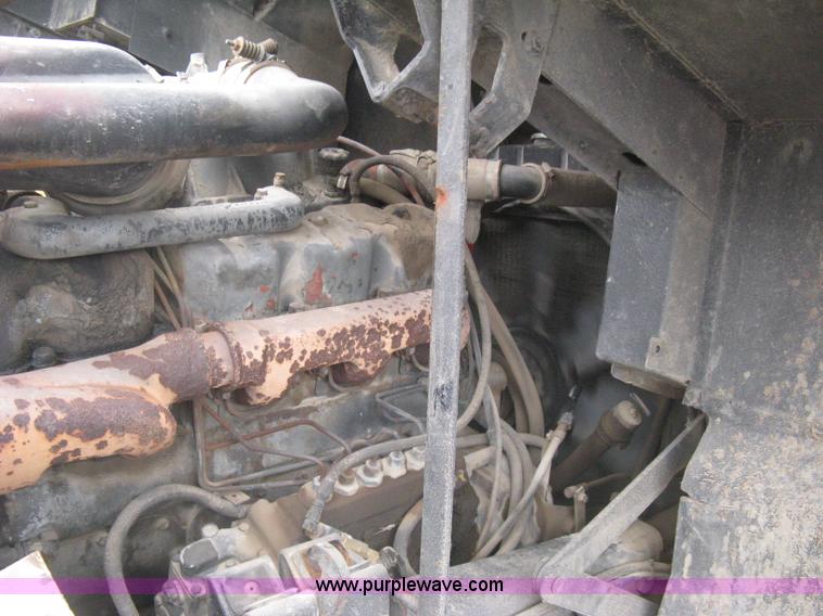 image for item H5424 1984 Mack MR686S roll-off truck