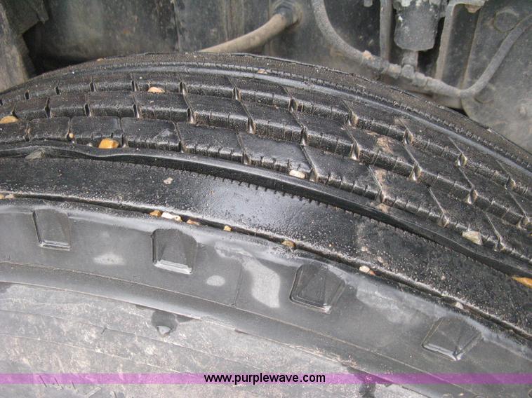 image for item H5424 1984 Mack MR686S roll-off truck