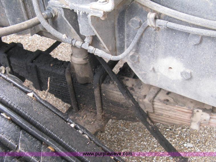 image for item H5424 1984 Mack MR686S roll-off truck