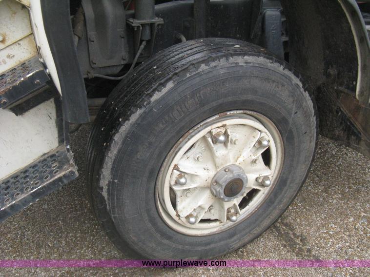 image for item H5424 1984 Mack MR686S roll-off truck