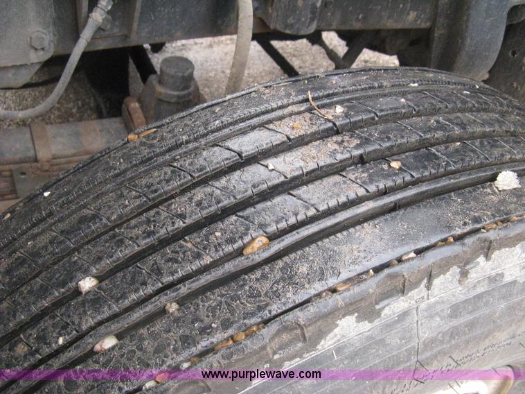 image for item H5424 1984 Mack MR686S roll-off truck