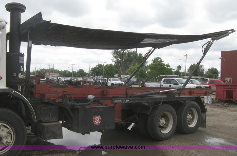 image for item H5424 1984 Mack MR686S roll-off truck