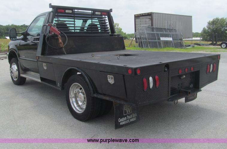 image for item H8969 2000 Ford F450 Super Duty XL flatbed truck