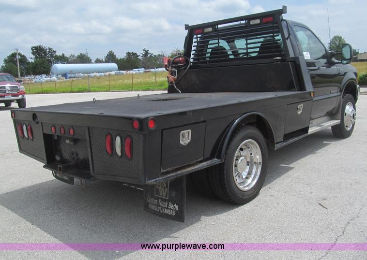 image for item H8969 2000 Ford F450 Super Duty XL flatbed truck