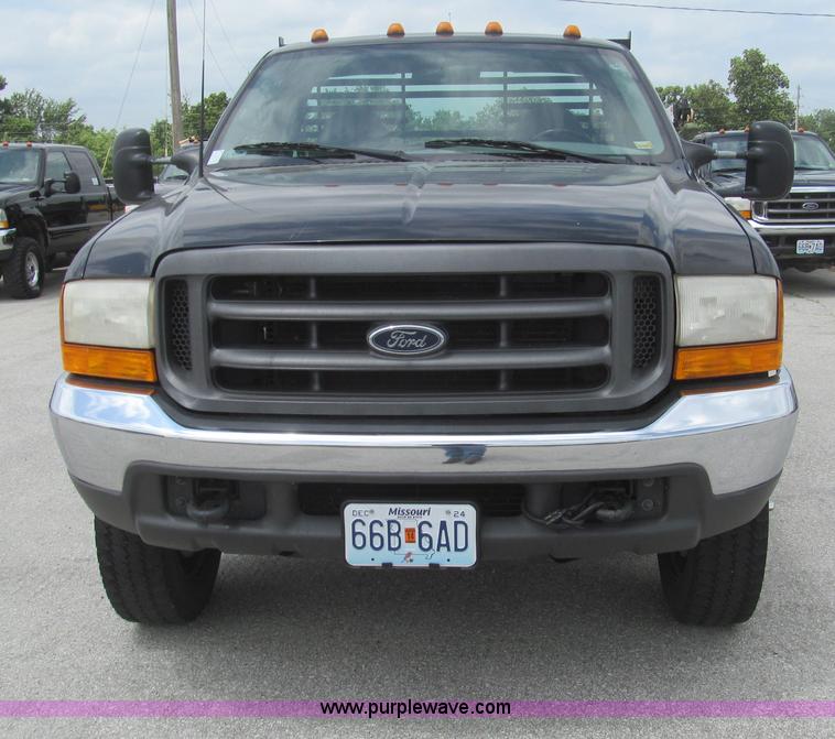 image for item H8969 2000 Ford F450 Super Duty XL flatbed truck