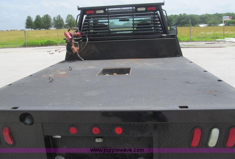 image for item H8969 2000 Ford F450 Super Duty XL flatbed truck