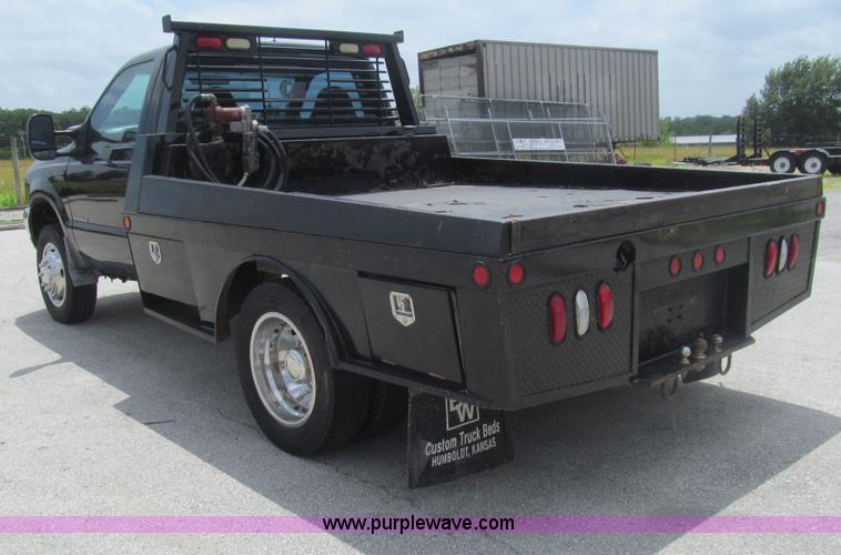 image for item H8970 1999 Ford F550 Super Duty XLT flatbed truck