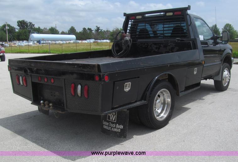 image for item H8970 1999 Ford F550 Super Duty XLT flatbed truck