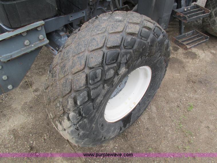 image for item I4163 2000 New Holland TL80 MFWD tractor