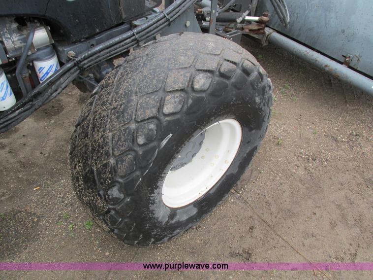 image for item I4163 2000 New Holland TL80 MFWD tractor