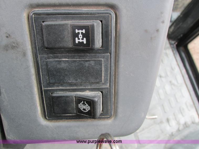 image for item I4163 2000 New Holland TL80 MFWD tractor