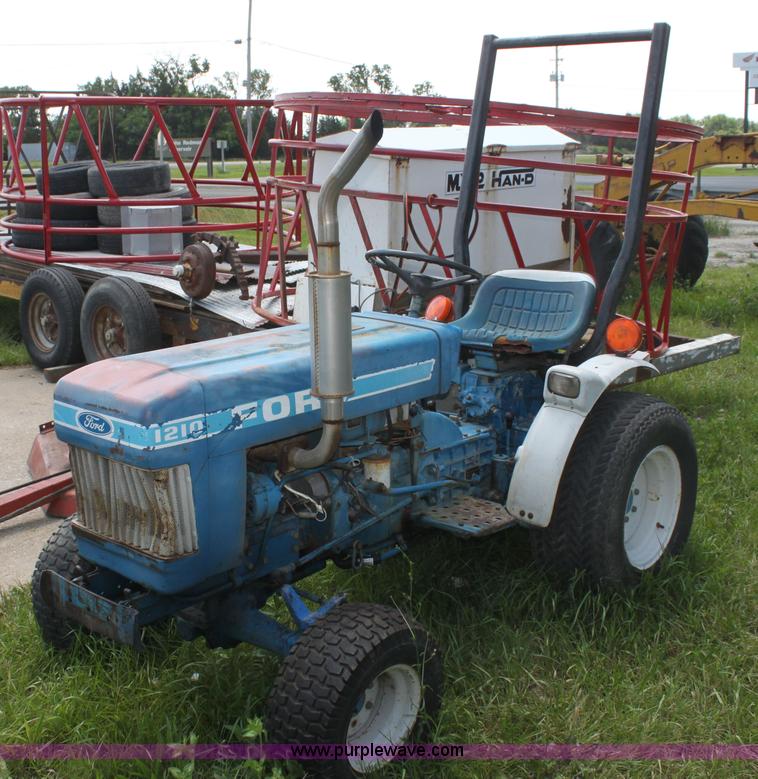 image for item I7348 Ford 1210 MFWD tractor