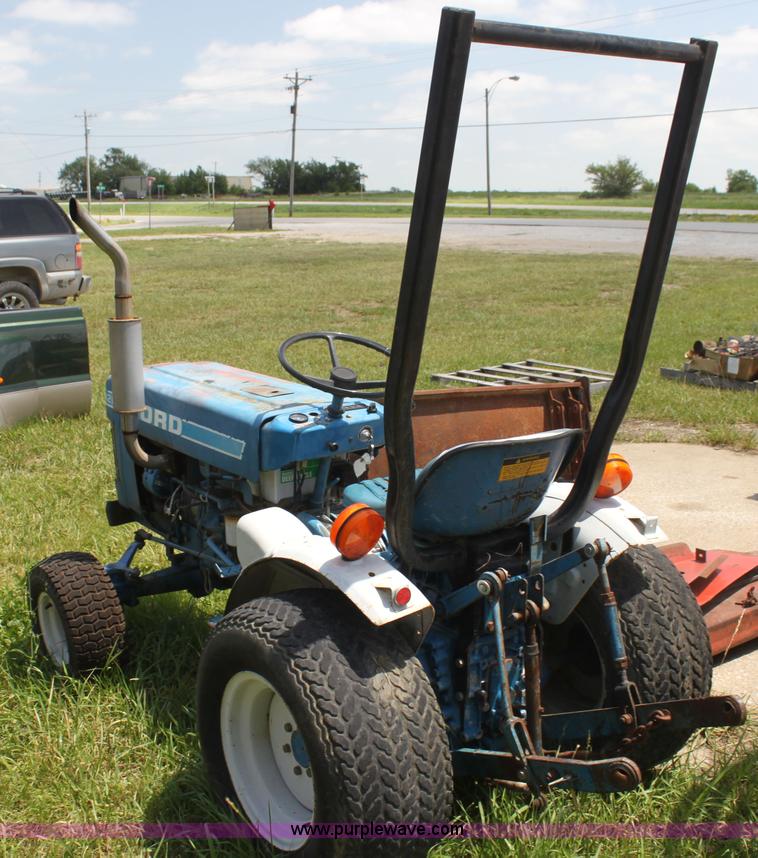 image for item I7348 Ford 1210 MFWD tractor