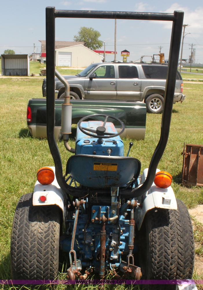 image for item I7348 Ford 1210 MFWD tractor