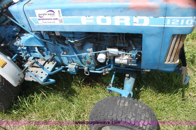 image for item I7348 Ford 1210 MFWD tractor