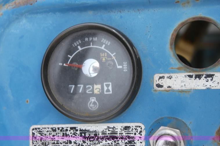 image for item I7348 Ford 1210 MFWD tractor
