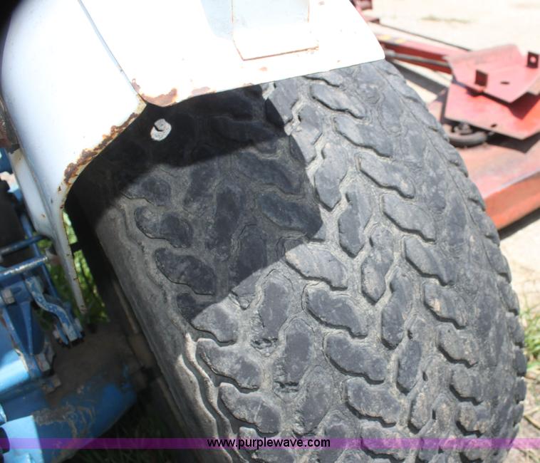 image for item I7348 Ford 1210 MFWD tractor