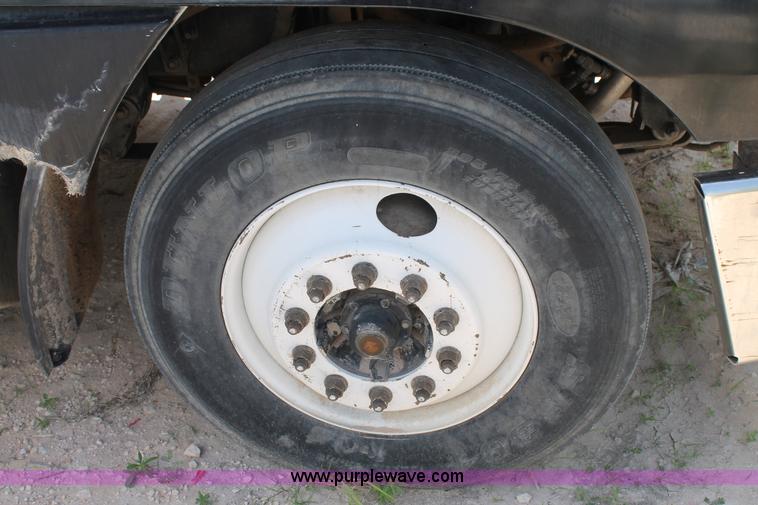 image for item C3897 2003 Freightliner Century Class ST120 semi truck