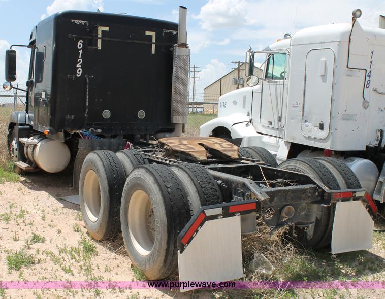 image for item C3899 2003 Freightliner Century Class ST120 semi truck