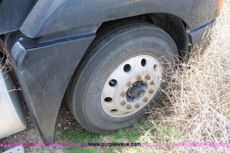 image for item C3899 2003 Freightliner Century Class ST120 semi truck