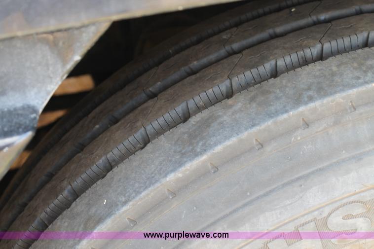 image for item C3899 2003 Freightliner Century Class ST120 semi truck