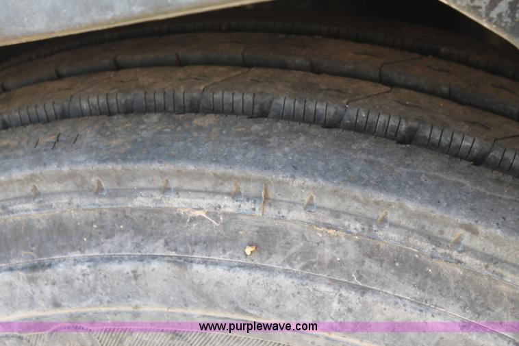 image for item C3899 2003 Freightliner Century Class ST120 semi truck