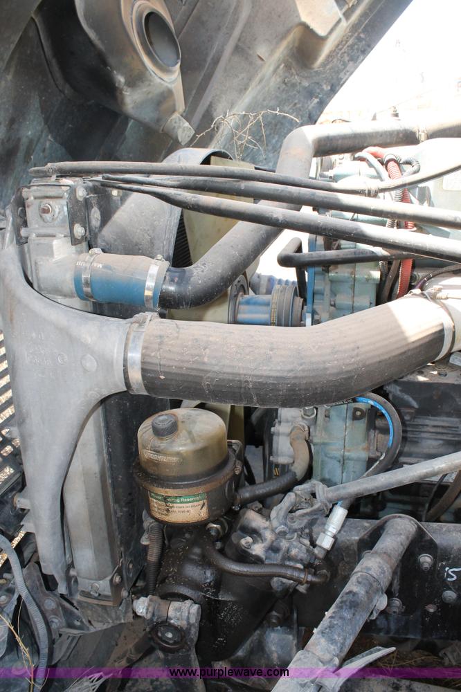 image for item C3899 2003 Freightliner Century Class ST120 semi truck