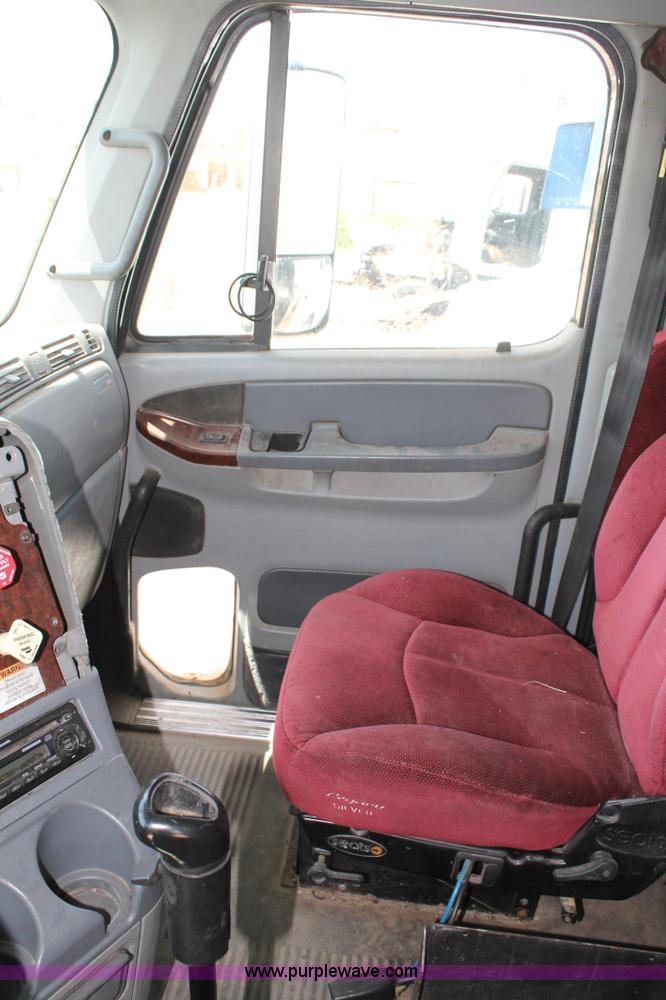 image for item C3899 2003 Freightliner Century Class ST120 semi truck