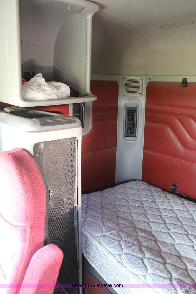 image for item C3899 2003 Freightliner Century Class ST120 semi truck