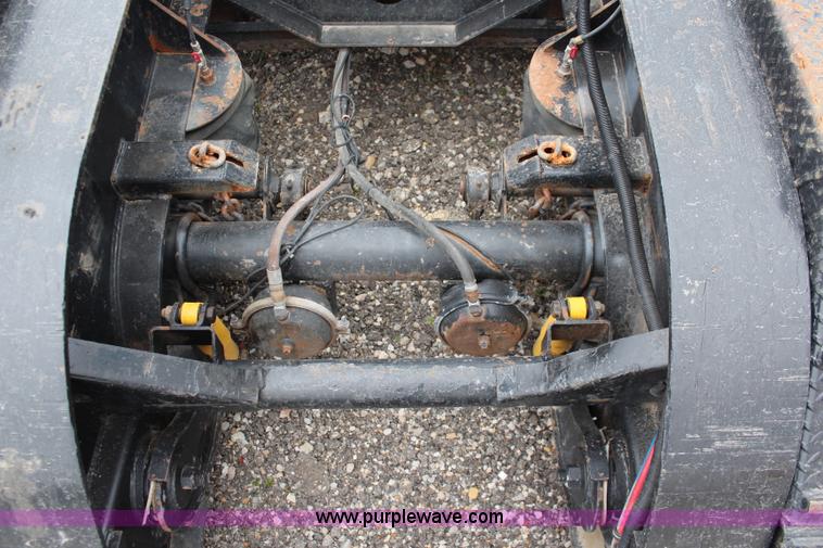 image for item J1146 1999 Fontaine TA50NGB lowboy trailer