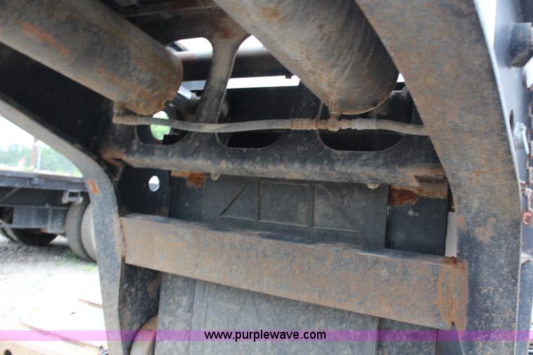 image for item J1146 1999 Fontaine TA50NGB lowboy trailer