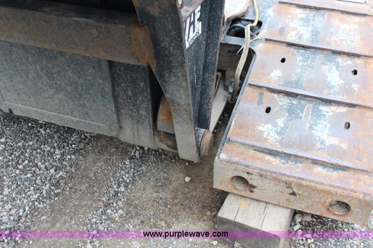 image for item J1146 1999 Fontaine TA50NGB lowboy trailer