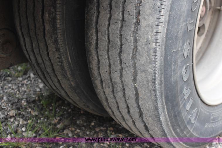 image for item J1146 1999 Fontaine TA50NGB lowboy trailer