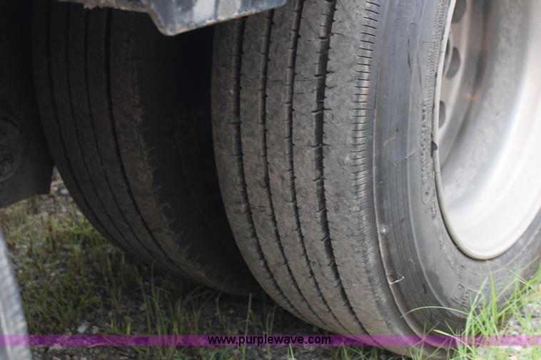 image for item J1146 1999 Fontaine TA50NGB lowboy trailer