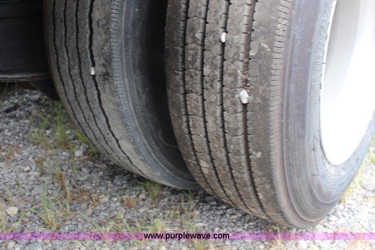 image for item J1146 1999 Fontaine TA50NGB lowboy trailer