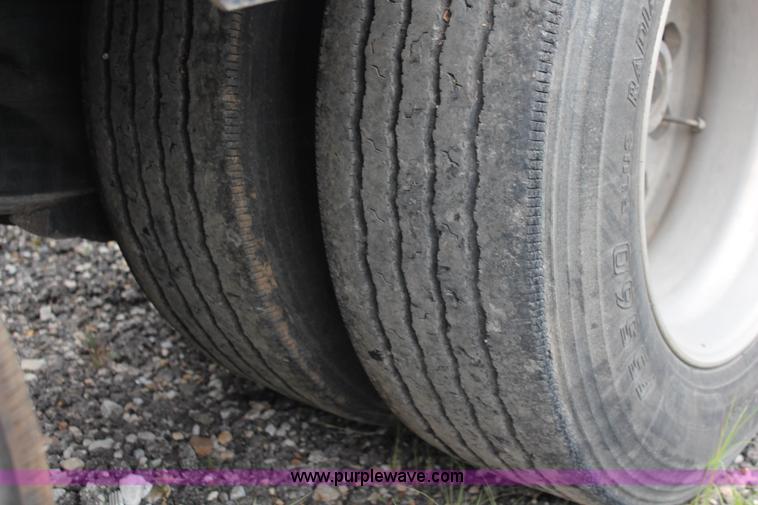 image for item J1146 1999 Fontaine TA50NGB lowboy trailer