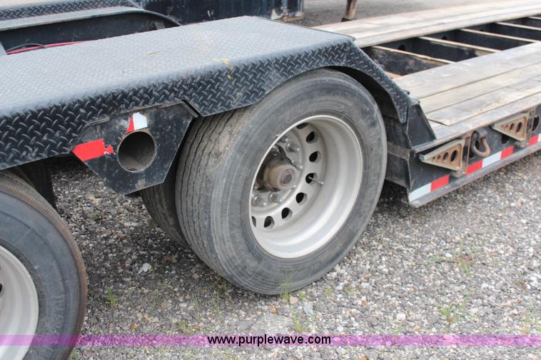 image for item J1146 1999 Fontaine TA50NGB lowboy trailer