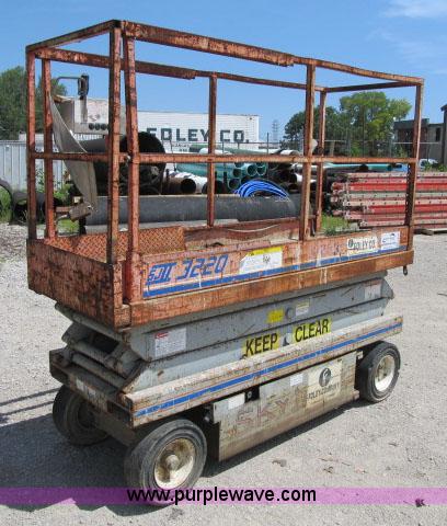 image for item F4949 1995 Skyjack 3220 electric scissor lift