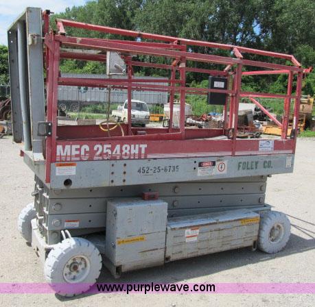image for item F4952 1999 Mec 2548 HT electric scissor lift