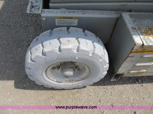 image for item F4952 1999 Mec 2548 HT electric scissor lift