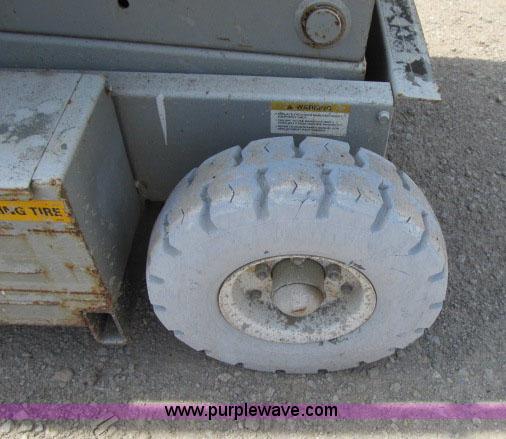 image for item F4952 1999 Mec 2548 HT electric scissor lift