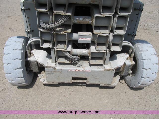 image for item F4952 1999 Mec 2548 HT electric scissor lift