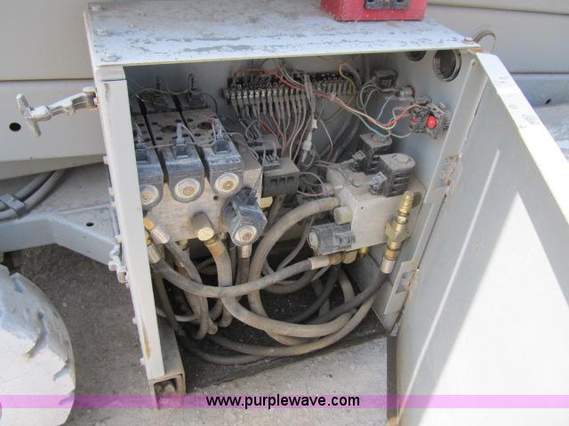 image for item F4952 1999 Mec 2548 HT electric scissor lift