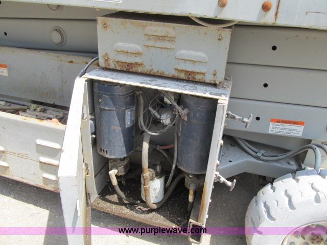 image for item F4952 1999 Mec 2548 HT electric scissor lift