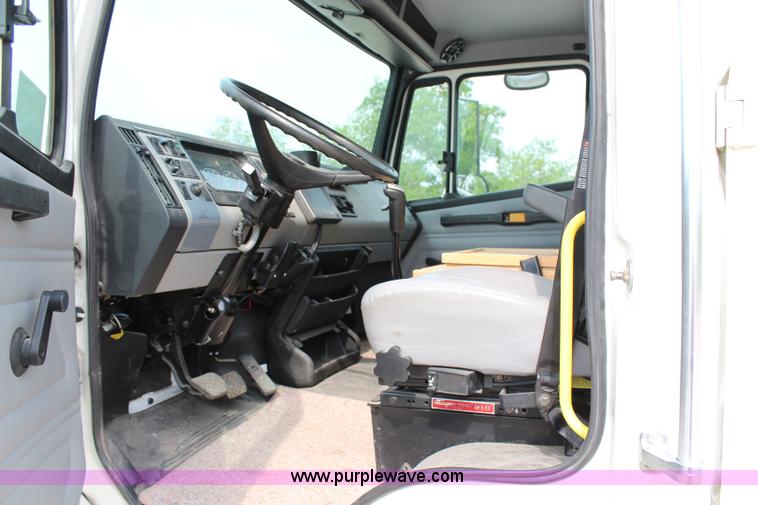 image for item H2715 2002 Freightliner FL70 Crew Cab flatbed truck